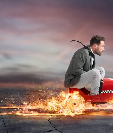 Ultrafast 100mb leased line personified by a Fast businessman with a flaming car